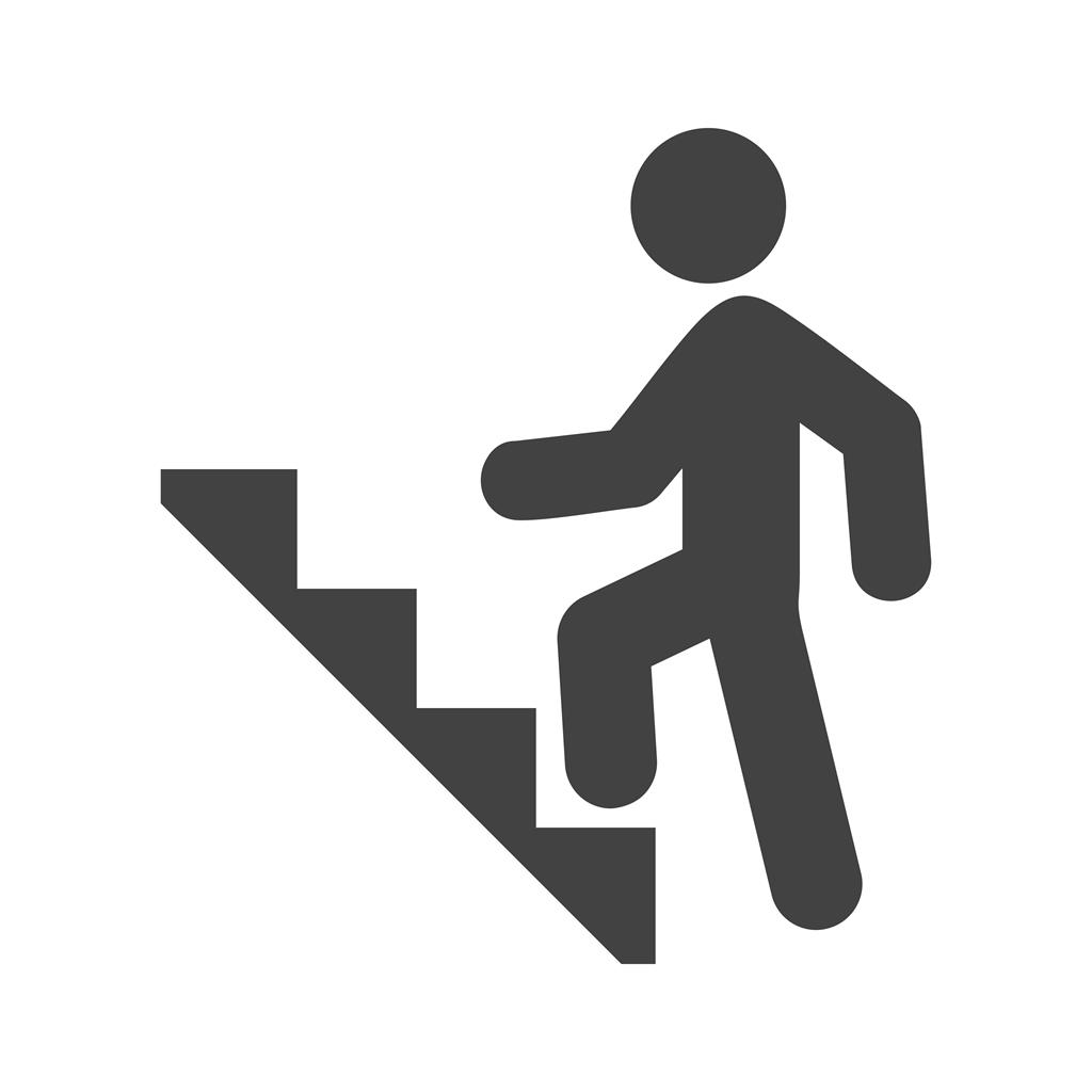 Climbing stairs Glyph Icon - IconBunny