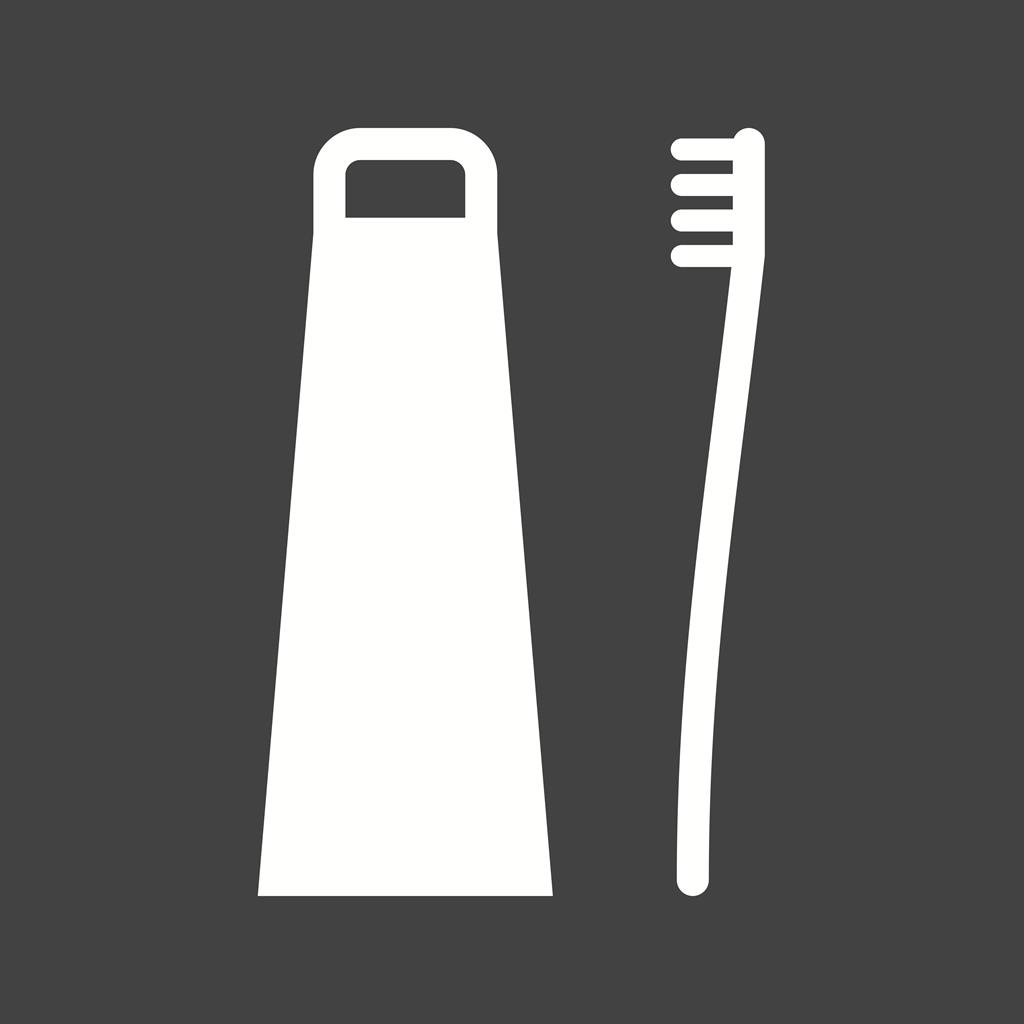 Toothbrush and Toothpaste Glyph Inverted Icon